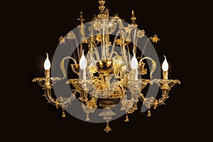 Beautiful chandelier (from Murano Italy) isolated on black background. photo