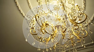 A beautiful Chandelier at a Restaurant. Could also be the Interior of a classy Bar or a Living Room.