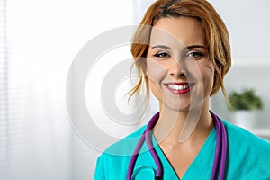 Beautiful charming friendly smiling female medicine therapeutist