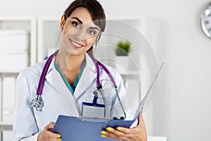 Beautiful charming friendly smiling female medicine therapeutist doctor