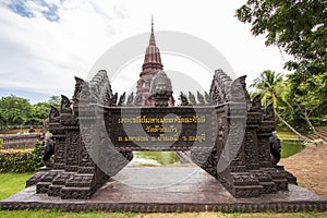 A beautiful chedi is located in the middle of the water at Huay Kaew Temple in Lop Buri Province