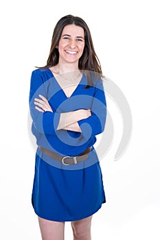 Beautiful cheerful slim smiling happy businesswoman arms crossed in blue dress over white background