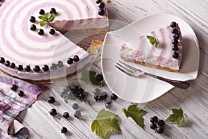 Beautiful cheese cake with currants close-up horizontal top view