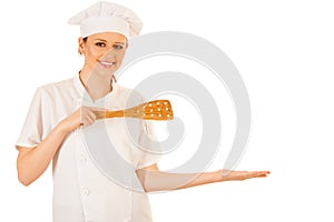 Beautiful chef presenting new recipe isolated over white