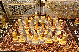 Beautiful chess set, made of wood, in on the Istanbul Grand Bazaar. Istambul, Turkey photo