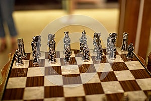 Beautiful chess set for sale on Grand Bazaar, Turkey. Made of wood and metallic materials. Chessboard, classic game, strategic,