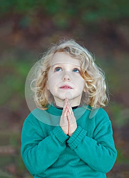 Beautiful child praying