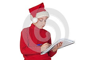 Beautiful child writing his Christmas letter