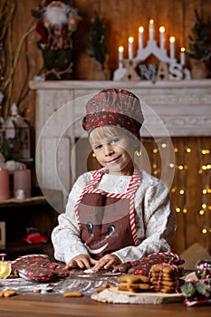 Beautiful children, blond kids, siblings, playing in decorated home for Christmas, enjoying holidays