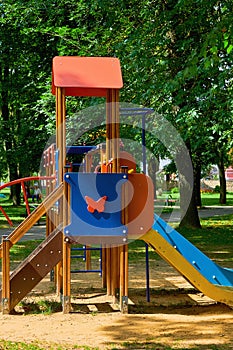 Beautiful children slide in the Park in summer.