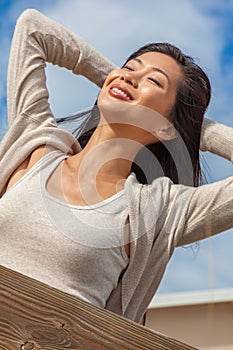 Beautiful Chinese Asian Young Woman Girl Relaxing in Sunshine