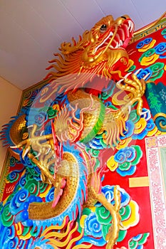 Beautiful Chinese dragons sculpture at Anek Kusala Sala Viharn Sien Chinese temple in Pattaya, Thailand. It was built in 1987 an photo
