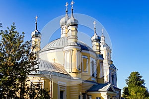 Beautiful Christian church among greenery against the sky