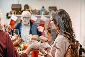 beautiful christian family praying before photo