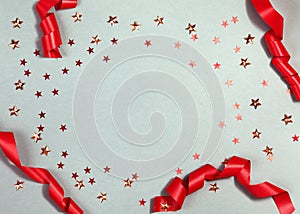 Beautiful Christmas Background with Shiny Red Balls and Ribbon in Bright Color. Top view with Copy Space