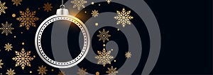 Beautiful christmas ball with golden snowflakes black banner