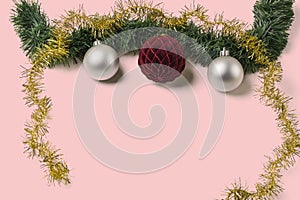 Beautiful Christmas balls decorations isolated on pink background.  Postcard. Christmas and New Year holidays concept background