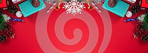 Beautiful christmas banner, symmetrical border made of gifts and decorations of the new year, top view and copy space