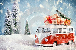 Beautiful christmas bus in snowy landscape