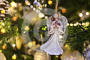 Beautiful Christmas composition with Christmas tree, holiday decoration, angel