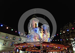 Beautiful Christmas decorations and Mariahilfer church , at night, in the city center of Graz, Styria region, Austria