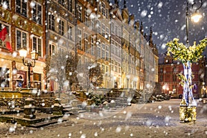 Beautiful Christmas decorations in the old town of Gdansk at snowy night. Poland