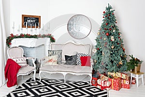 Beautiful Christmas interior. New year decoration. Comfort home. Classic new year tree decorated in a room with