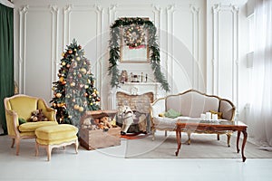 Beautiful Christmas interior. New year decoration. Living room with fireplace