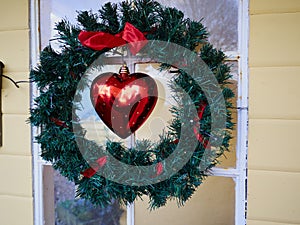 Beautiful Christmas reef on a front door of a house