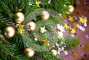 Beautiful Christmas still life with golden balls on a spruce branch stock images