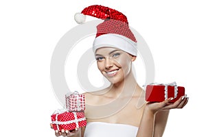 Beautiful Christmas Woman. Beauty Girl in the New Year. Model in a Santa hat