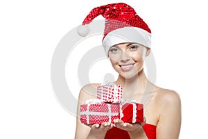 Beautiful Christmas Woman. Beauty Girl in the New Year. Model in a Santa hat