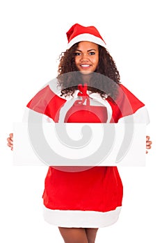 Beautiful christmas woman in santa hat with blank white board