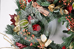 Beautiful Christmas wreath with decorations on white background, closeup photo