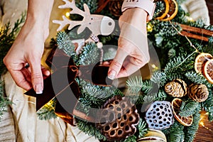 Beautiful christmas wreath and hands.