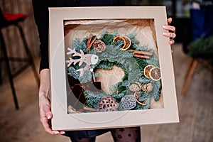 Beautiful christmas wreath at table.