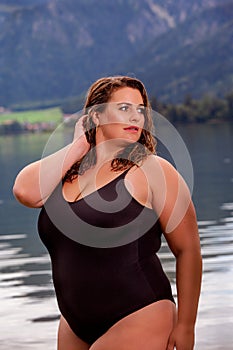 Beautiful chubby woman in a swimsuit