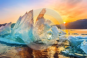 Beautiful chunk of Ice at Sunrise in winter.