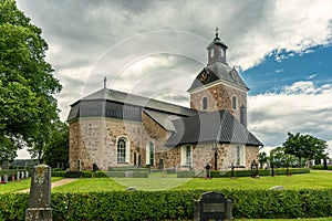 Beautiful church with cemetery in St.Skedvi in Sweden