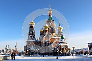 A beautiful church stands in the city on a sunny winter day.