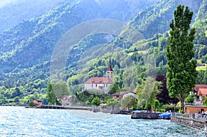 Beautiful church to the Brienz town on lake Brienz by Interlaken