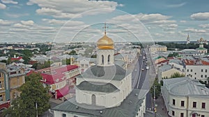 Beautiful cinematic shot of the golden dome on the gate in the city of Vladimir