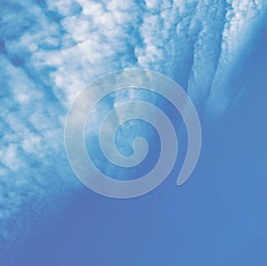 Beautiful cirrus clouds on the sky. Abstract nature background. Toned