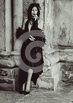 Gothic lady in a luxurious glamorous retro look for Halloween