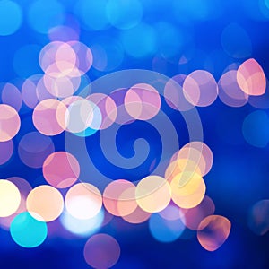 Beautiful city blurring lights abstract circular bokeh blue back