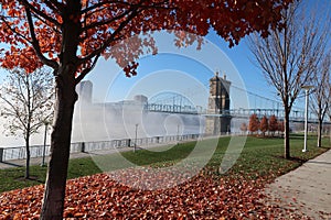 A beautiful city bridge sit in the mornings heavy fog