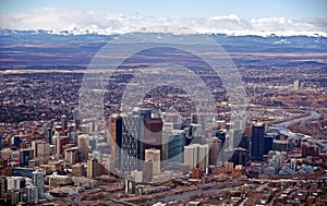 Beautiful City of Calgary with snow covered canadian rockies in the background