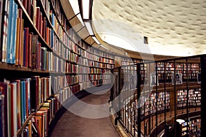 Beautiful Stockholm city library with rows of books in several levels.