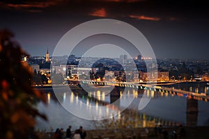 Beautiful city night landscape, view of the Danube city Novi Sad tilt shift effect