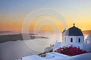 The beautiful city of Oia in Santorini/Greece during golden sunset.